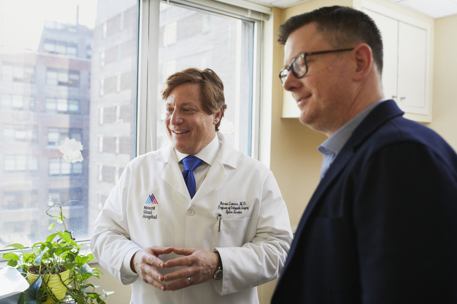 Canva - Man Next to Doctor