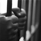 jail-hands-bw
